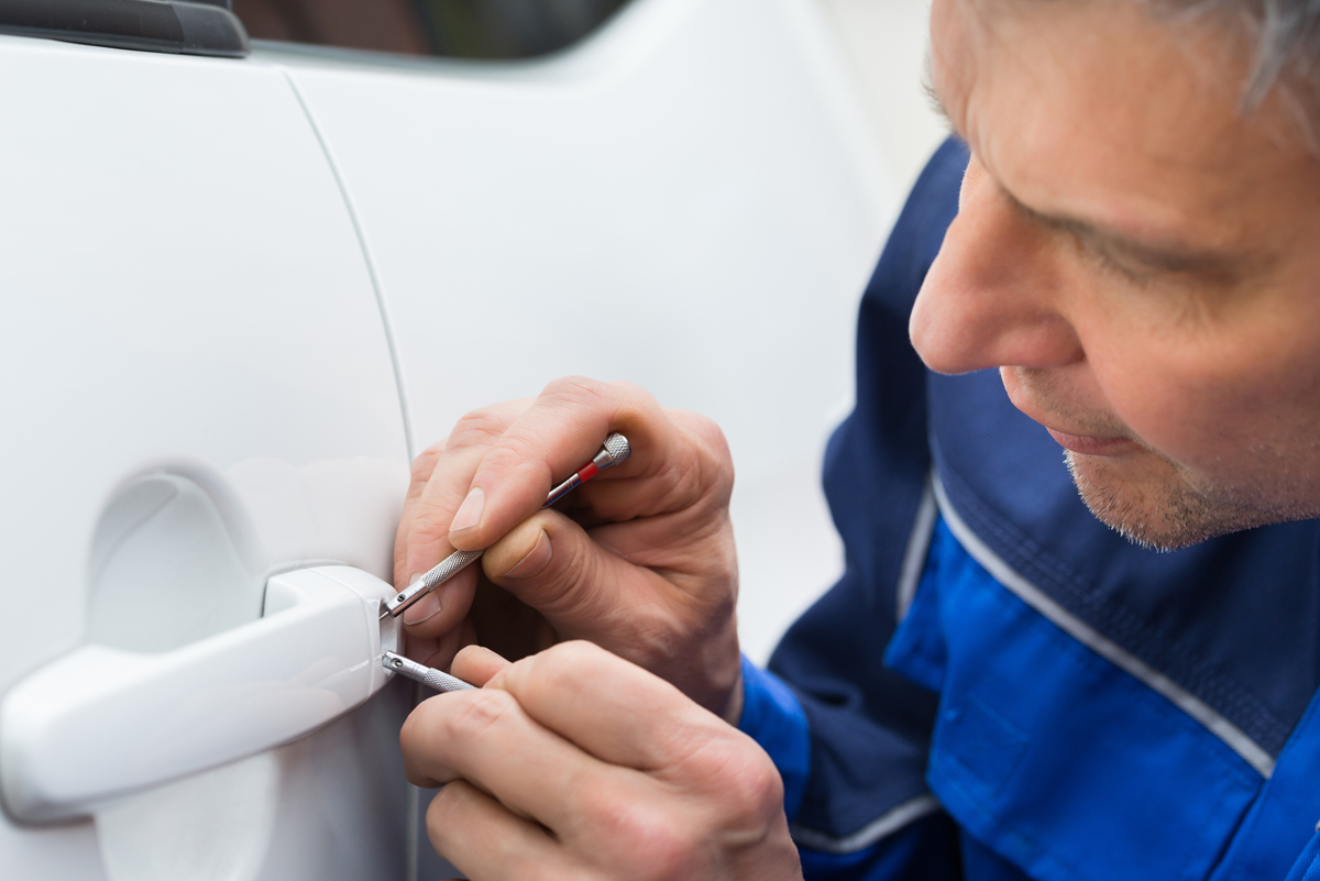 How do locksmiths gain access to locked Vehicles